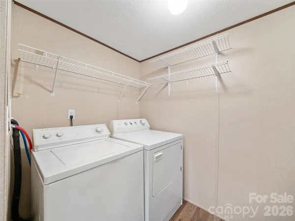 a view of a lush green hillside and a building