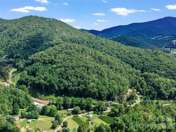 a view of mountains and valleys