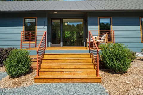 a front view of a house with a porch