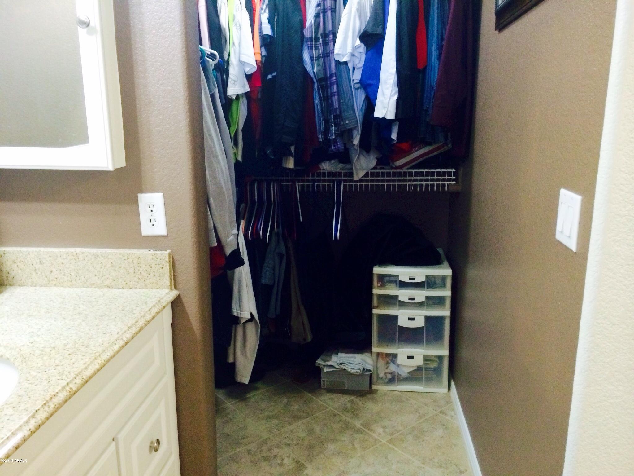 12730 West Redfield Road El Mirage, AZ 85335 - Photo 15 of 24 Master has a nice size walk-in Closet