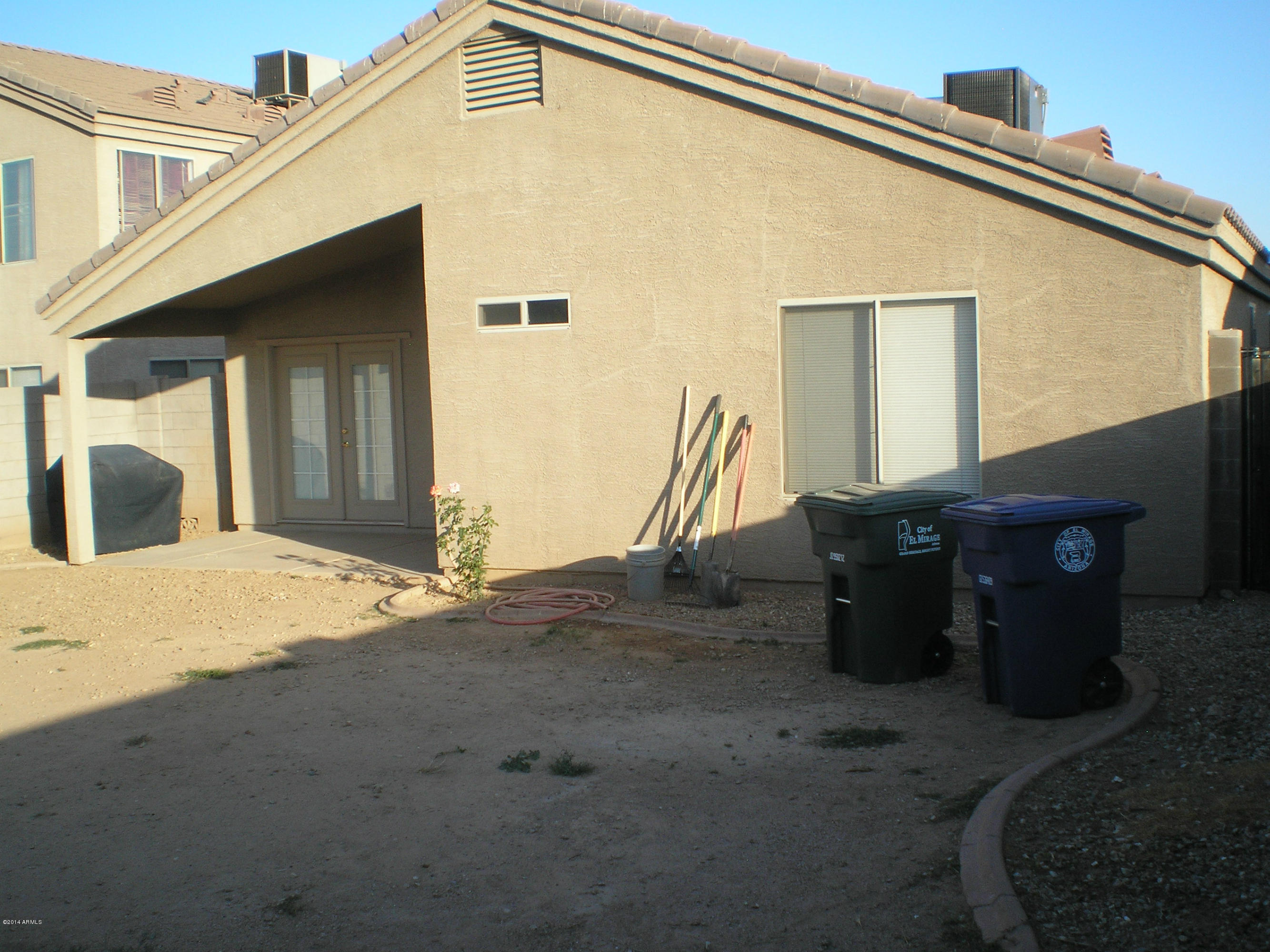 12730 West Redfield Road El Mirage, AZ 85335 - Photo 24 of 24 Rear View of Home and Covered Patio