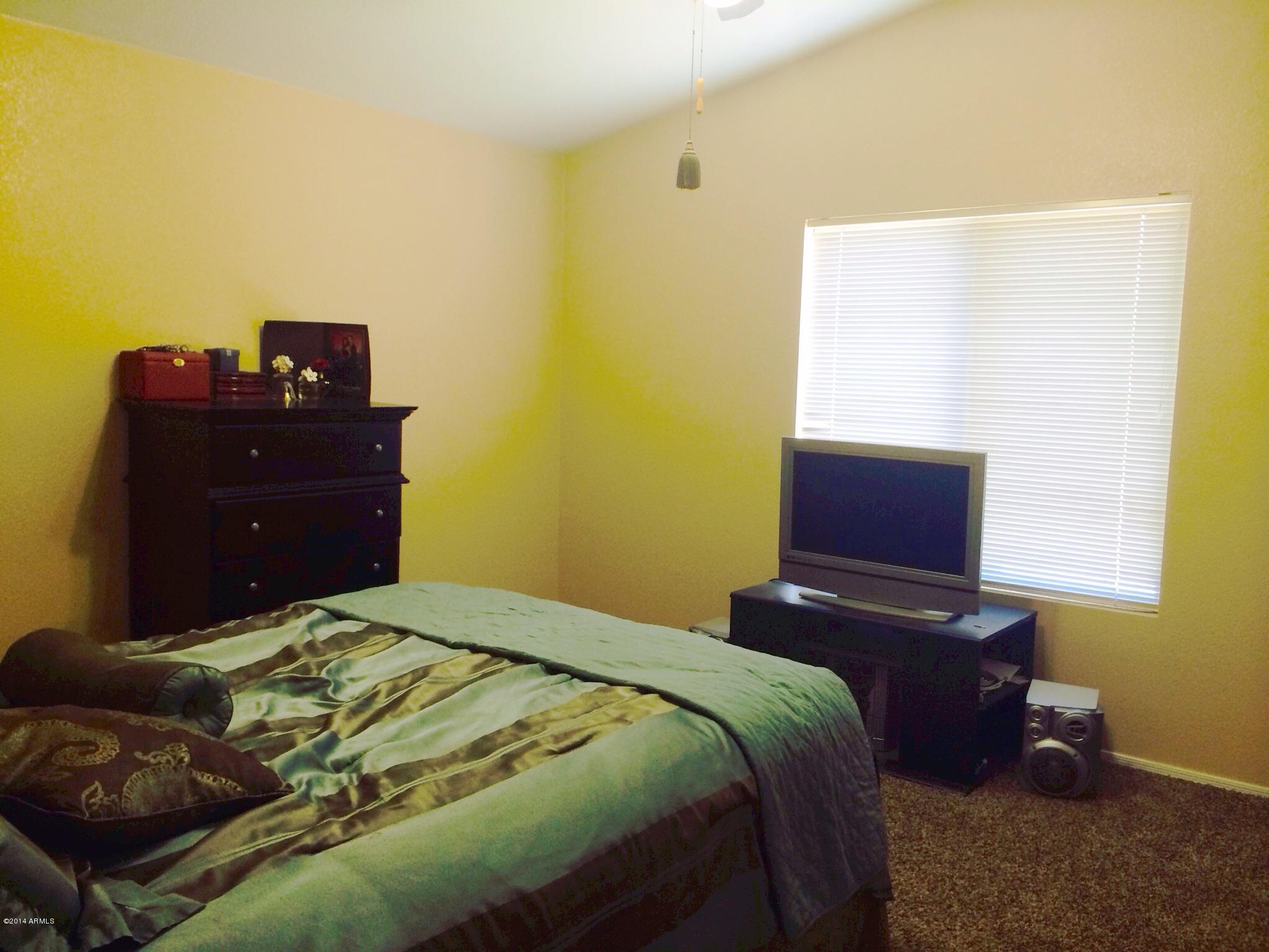 12730 West Redfield Road El Mirage, AZ 85335 - Photo 10 of 24 Master Bedroom