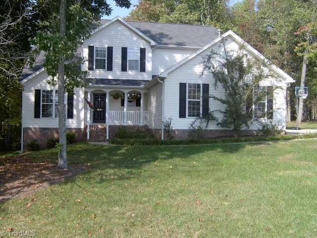 7915 McCreedy Drive Oak Ridge, NC 27310 - Photo 1 of 9 Exterior Front.