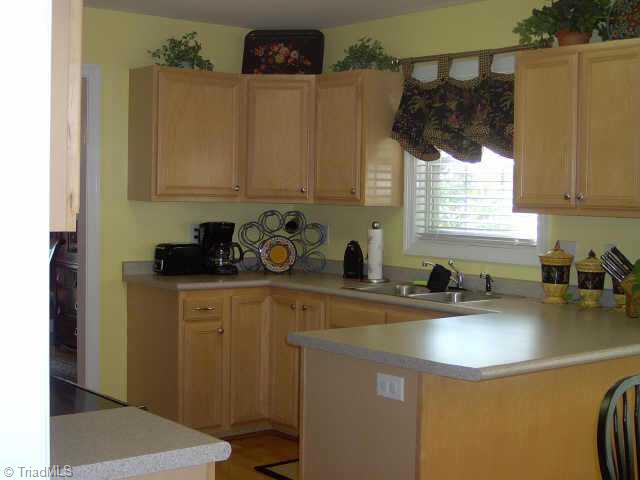 7915 McCreedy Drive Oak Ridge, NC 27310 - Photo 3 of 9 Other. Nice size kitchen with plenty of counter space.