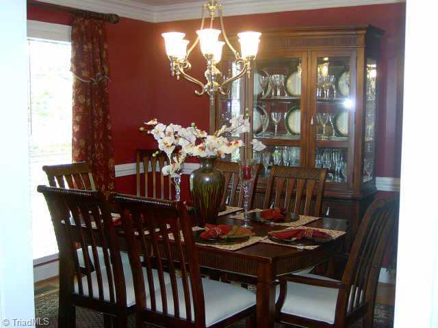 7915 McCreedy Drive Oak Ridge, NC 27310 - Photo 5 of 9 Other. Dining room with chair rail.