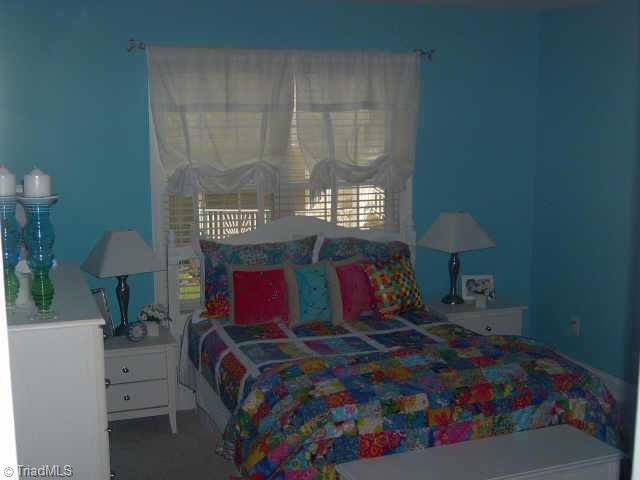 7915 McCreedy Drive Oak Ridge, NC 27310 - Photo 7 of 9 Other. One of the upstairs bedrooms.