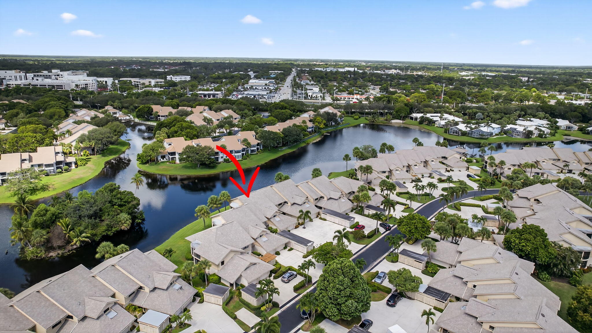 16941 Waterbend Drive, Unit 252 Jupiter, FL 33477 - Photo 30 of 34 an aerial view of residential houses with outdoor space