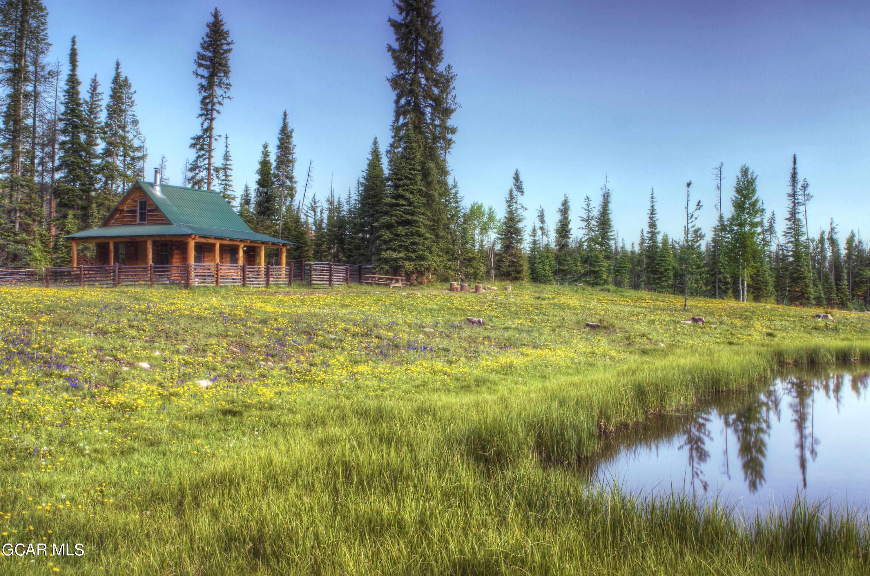 341 Corral Trail Silverthorne, CO 80498 - Photo 15 of 19 a view of a house with a yard