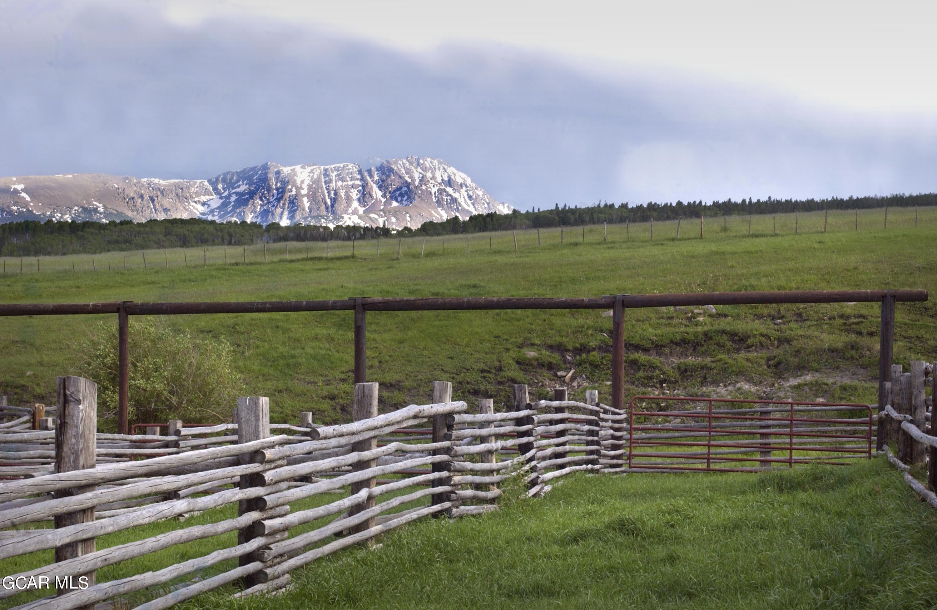 341 Corral Trail Silverthorne, CO 80498 - Photo 17 of 19 a view of a lake with a big yard