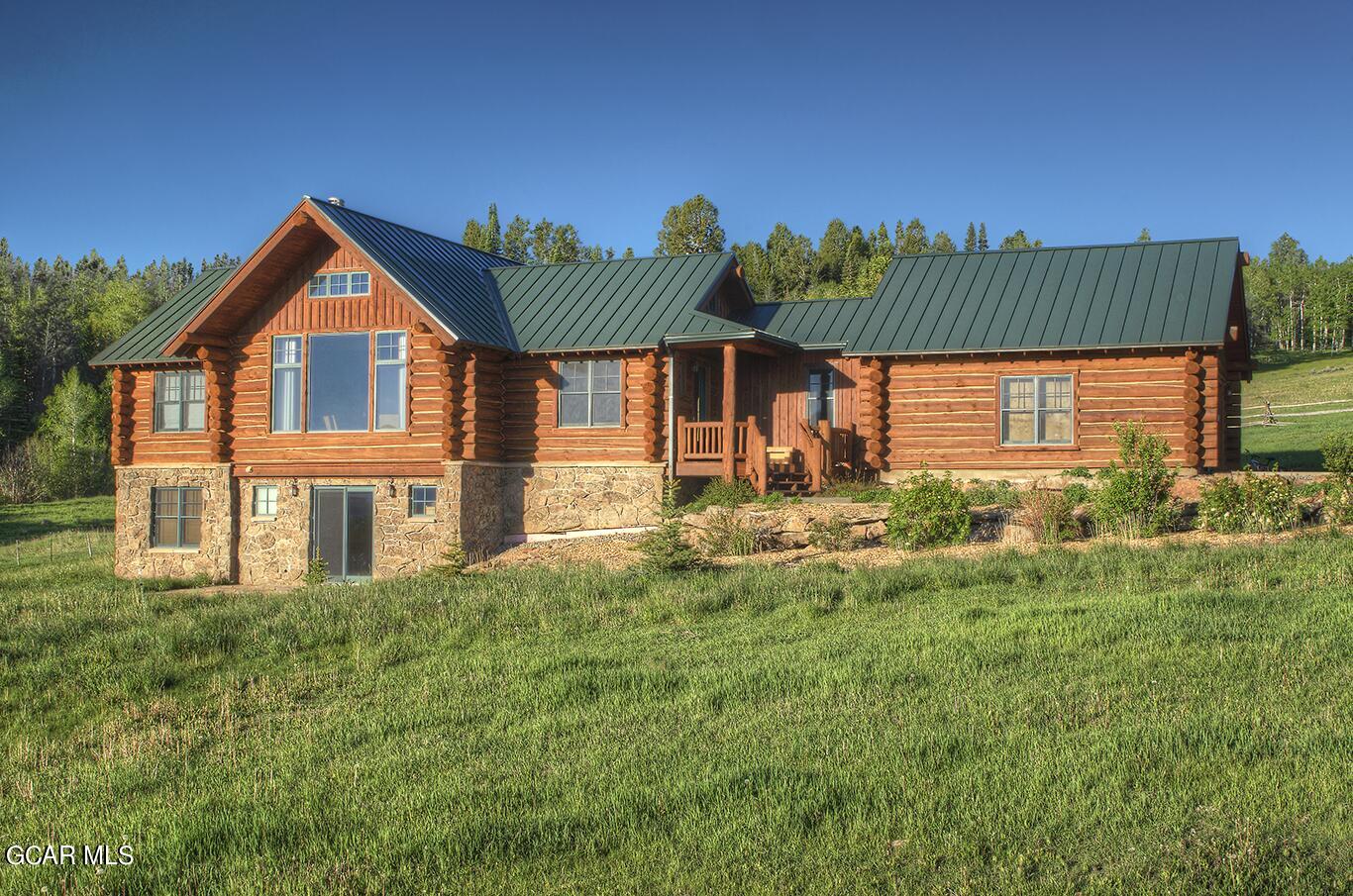 341 Corral Trail Silverthorne, CO 80498 - Photo 4 of 19 a front view of a house with garden