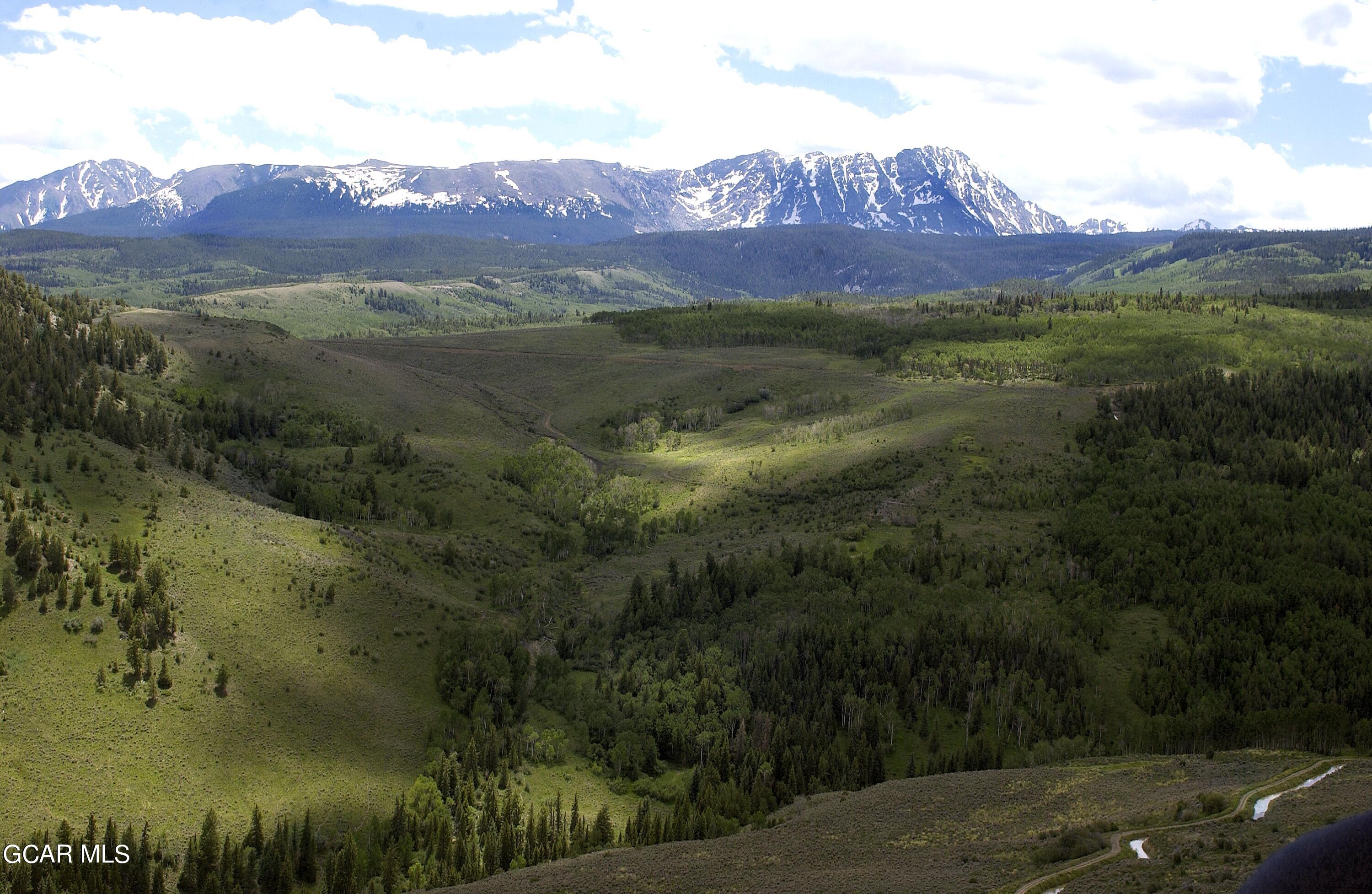 341 Corral Trail Silverthorne, CO 80498 - Photo 6 of 19 a view of a city with mountains in the background
