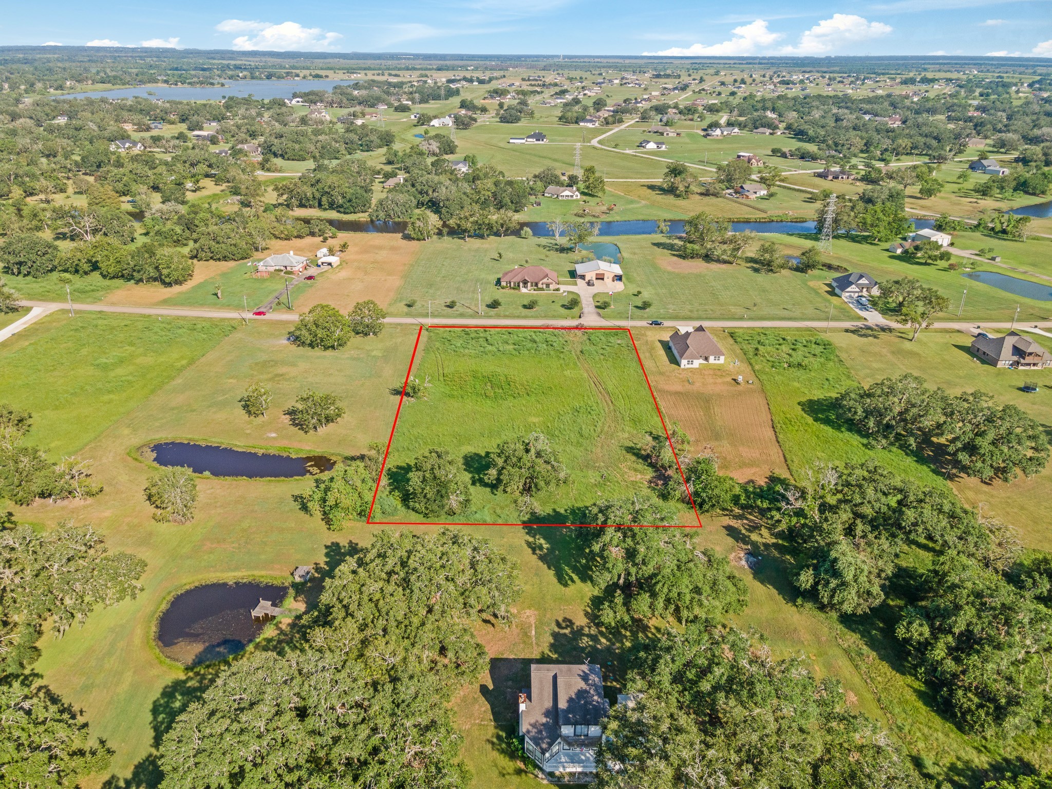 626 Mill Road Angleton, TX 77515 - Photo 4 of 12 an aerial view of ocean with residential building and ocean view