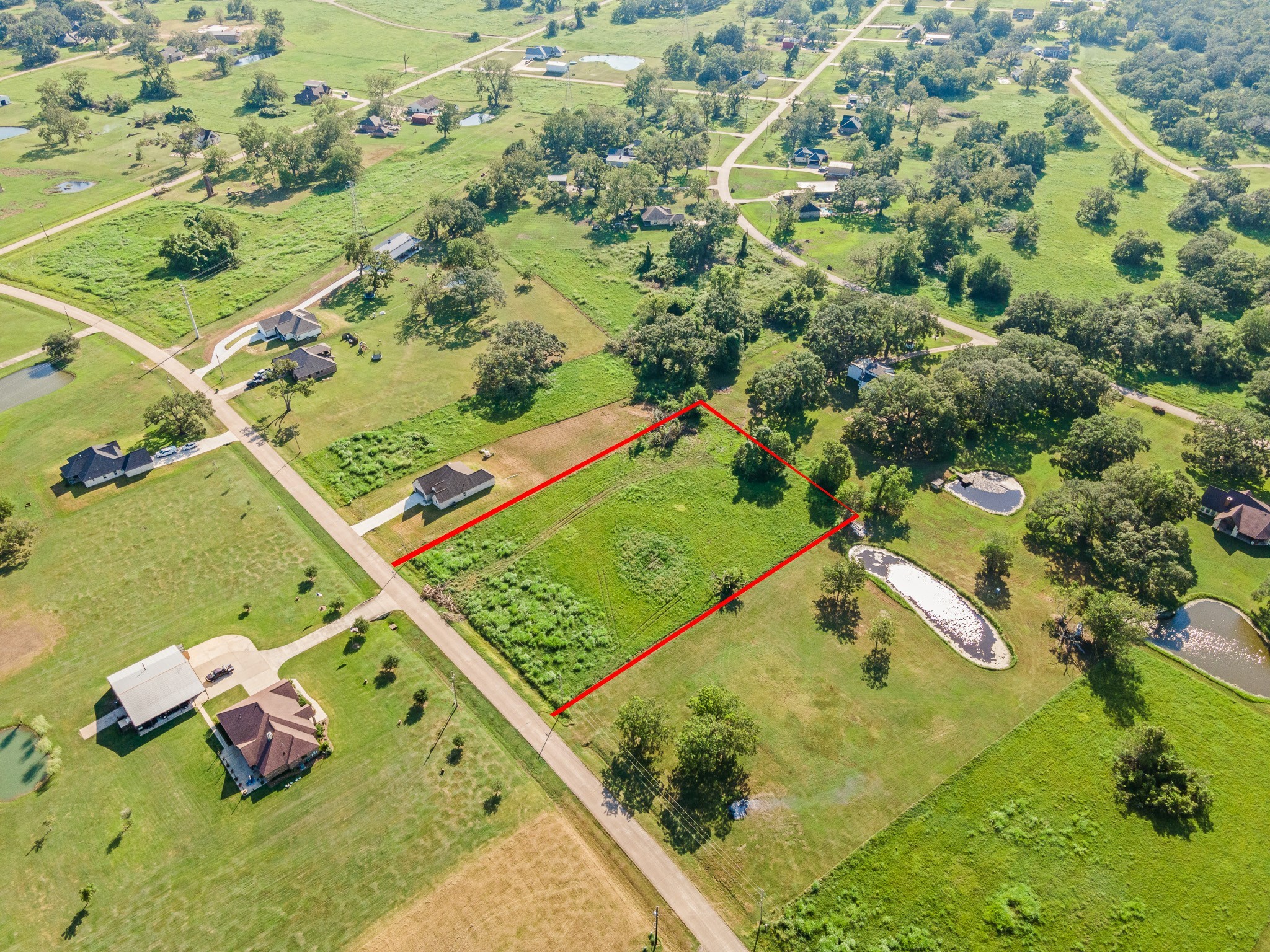 626 Mill Road Angleton, TX 77515 - Photo 9 of 12 an aerial view of a residential houses with outdoor space