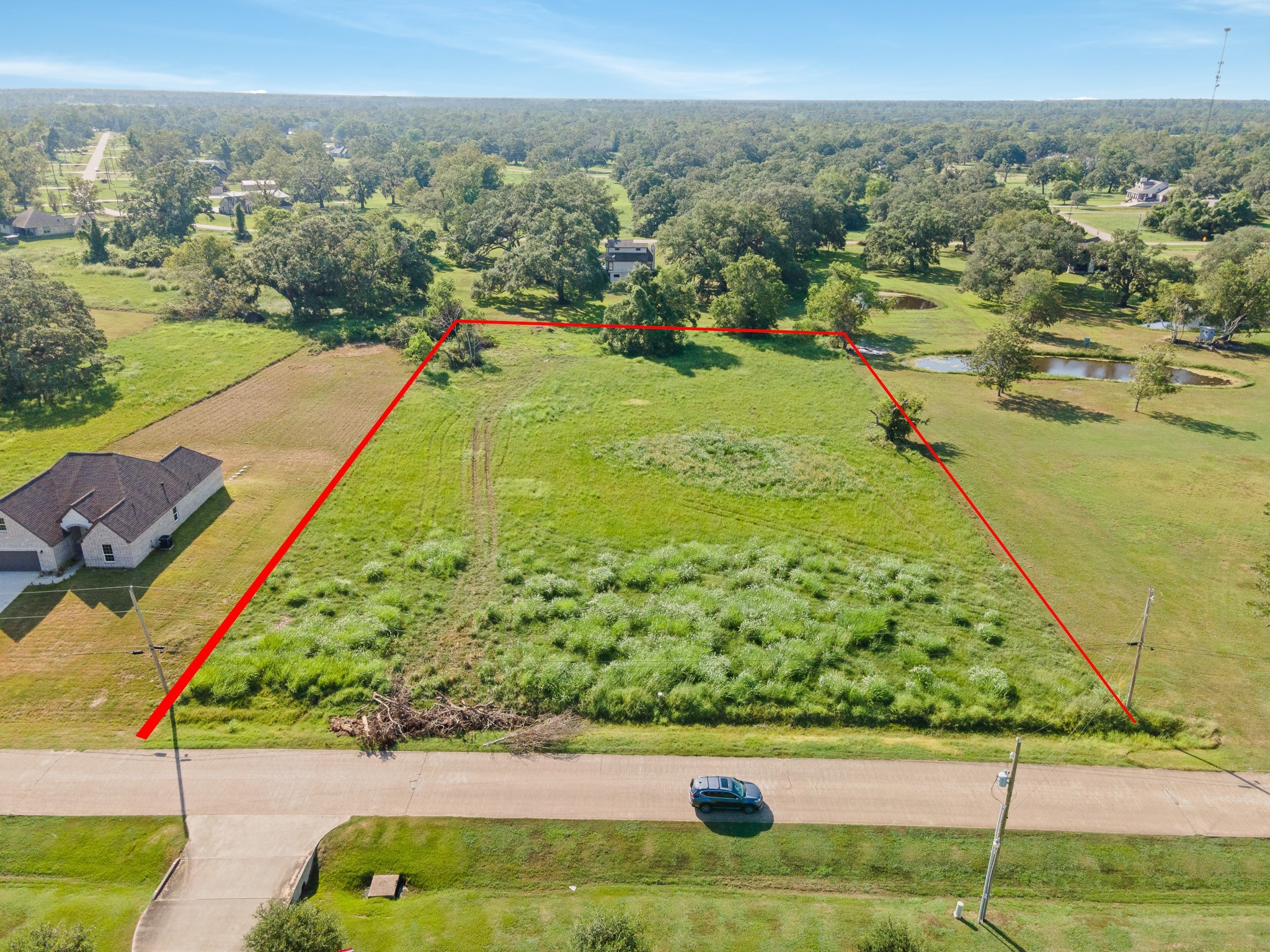 626 Mill Road Angleton, TX 77515 - Photo 10 of 12 a view of a yard with an ocean view