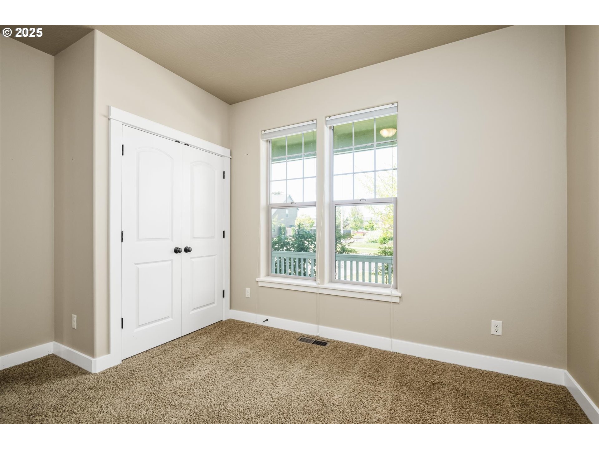 3768 Pachysandra Place Eugene, OR 97402 - Photo 30 of 41 a view of an empty room with a window