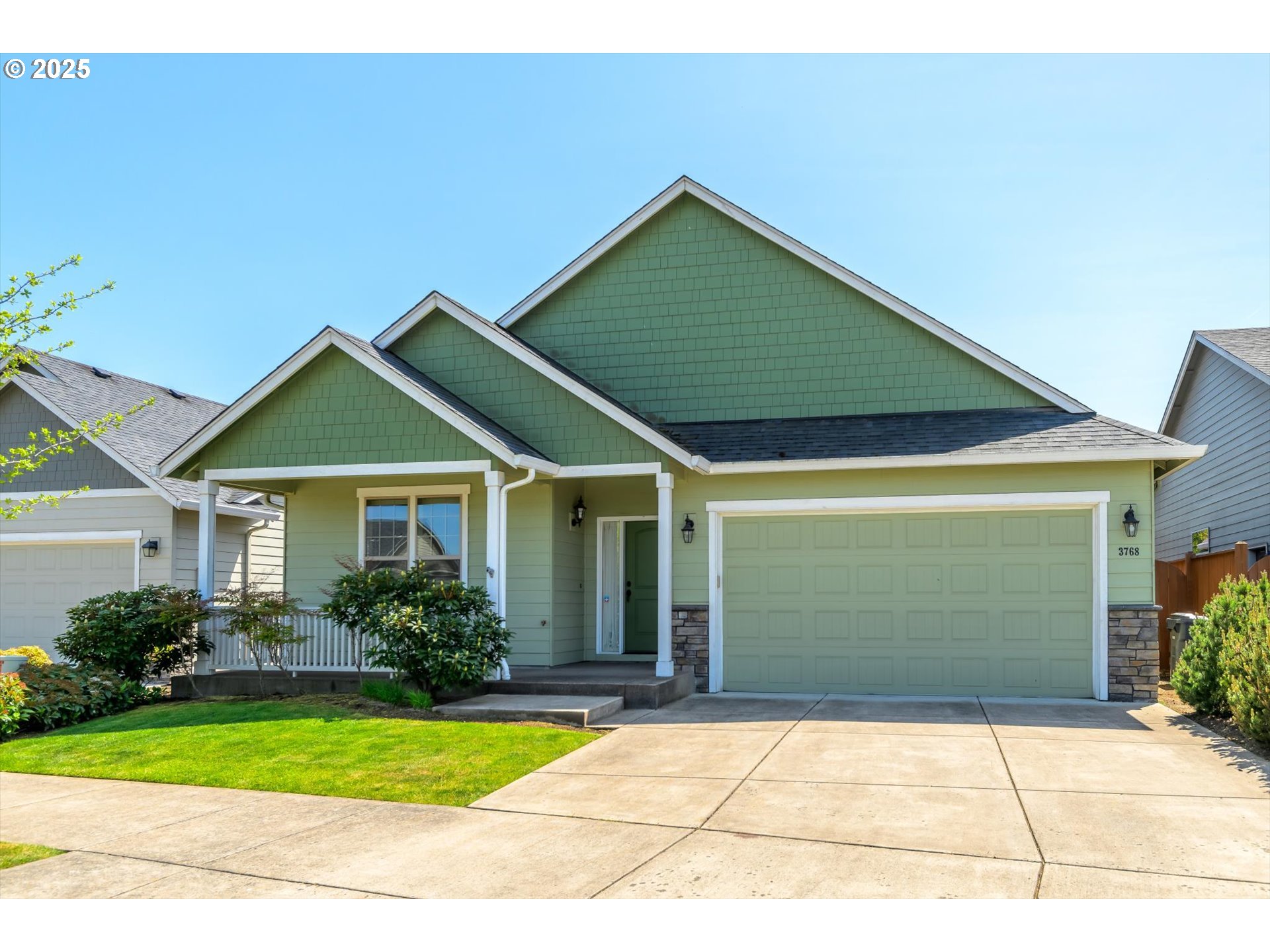 3768 Pachysandra Place Eugene, OR 97402 - Photo 3 of 41 a front view of a house with garden