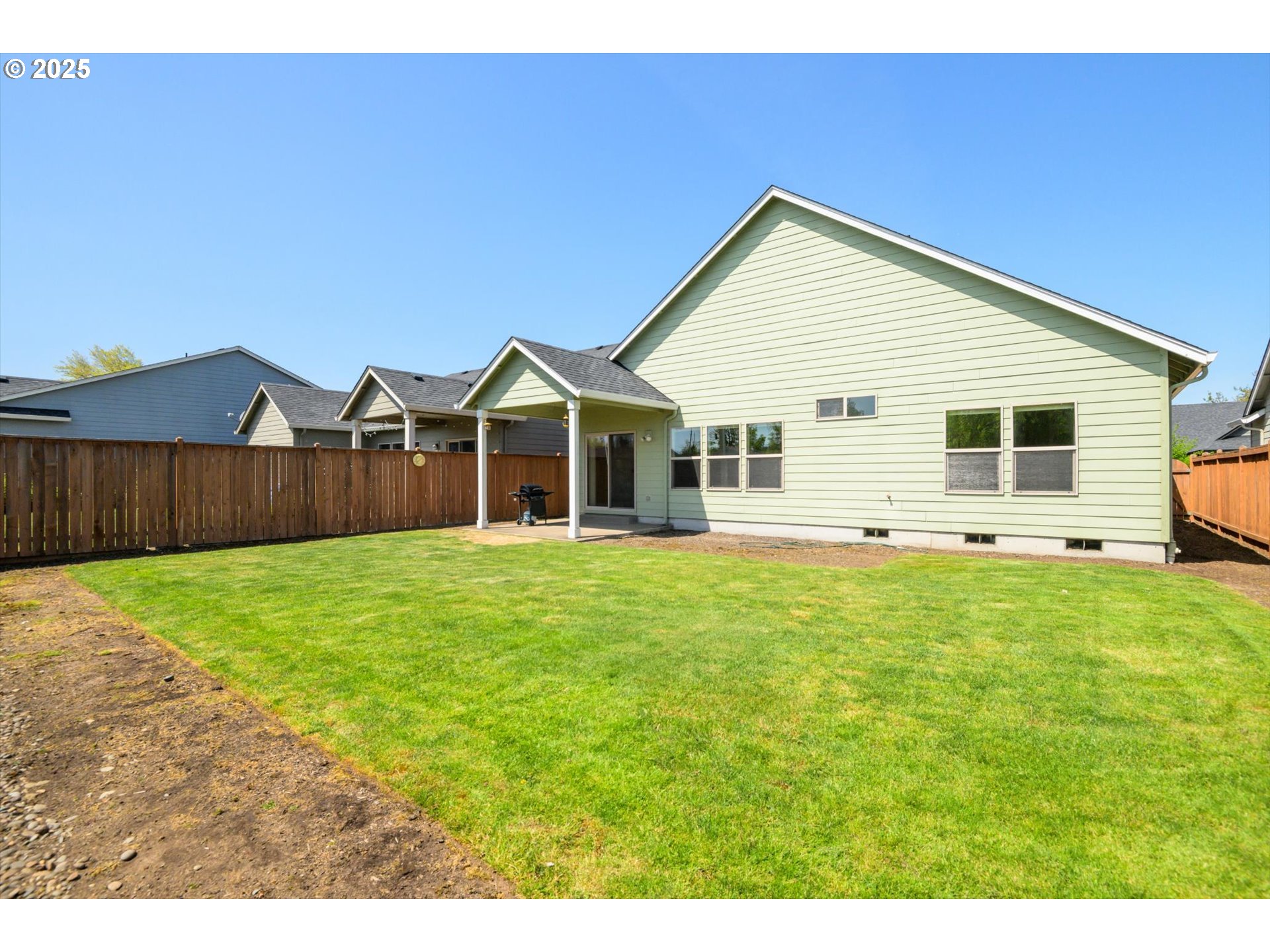 3768 Pachysandra Place Eugene, OR 97402 - Photo 34 of 41 a view of a house with a backyard