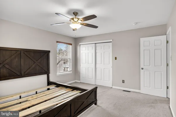 a living room with pool table and flat screen tv