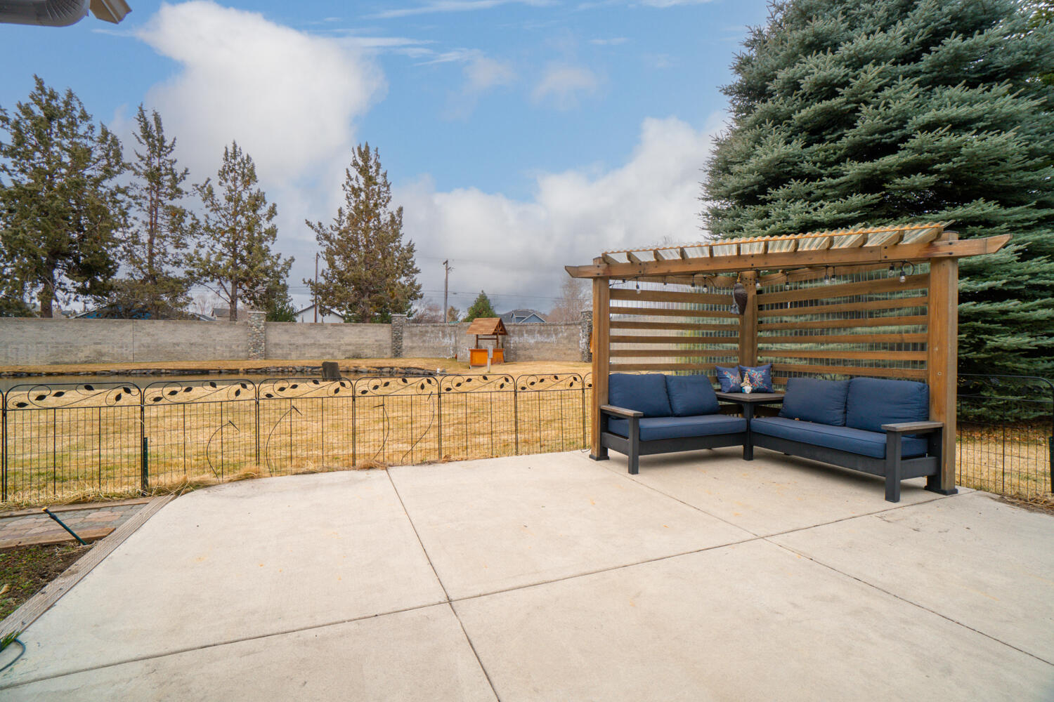 3397 Northeast Stonebrook Loop Bend, OR 97701 - Photo 22 of 35 Rear patio area (pergola excluded from sale)