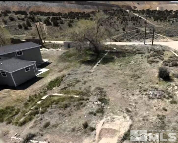 29 Keystone Street Ruth, NV 89319 - Photo 1 of 6 a view of a yard with wooden fence