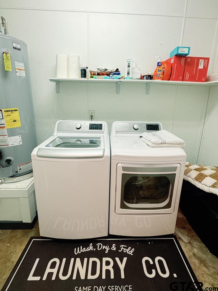 2411 Rodge Drive Tyler, TX 75701 - Photo 37 of 42 a utility room with dryer and washer