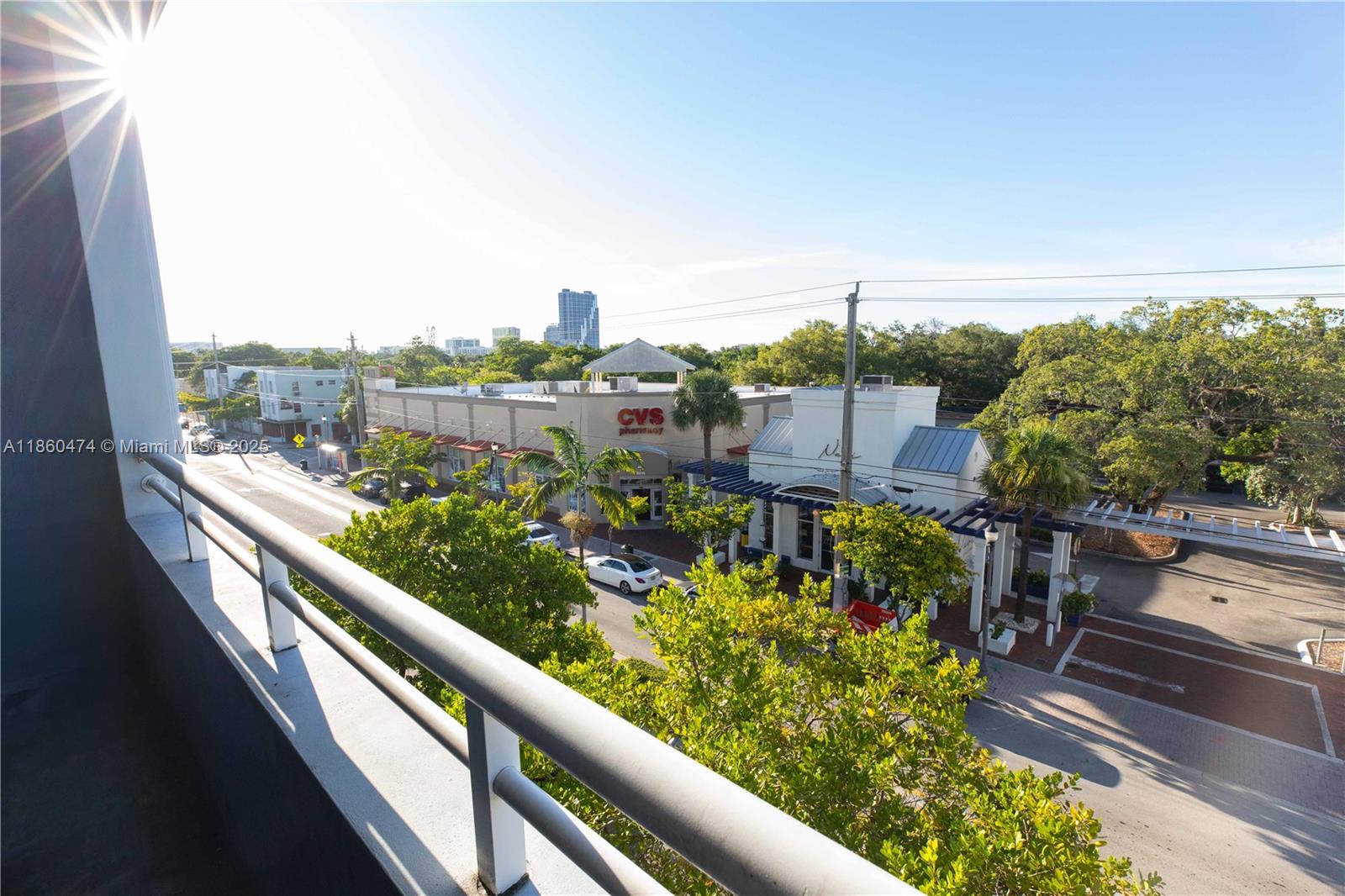 3250 Grand Avenue, Unit 404 Miami, FL 33133 - Photo 10 of 17 a view balcony with wooden floor