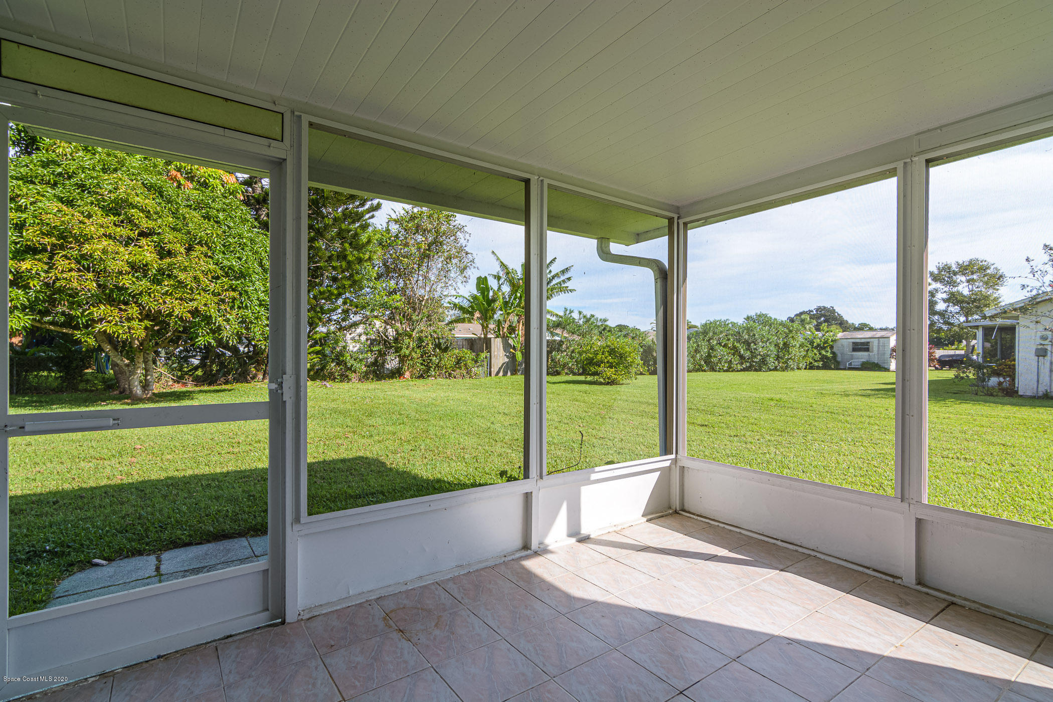 1220 Creel Road Northeast Palm Bay, FL 32905 - Photo 23 of 34 screened porch