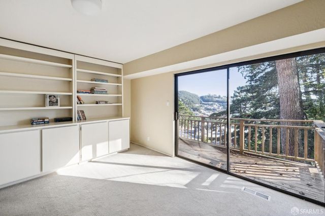 a view of a utility room with empty shelves