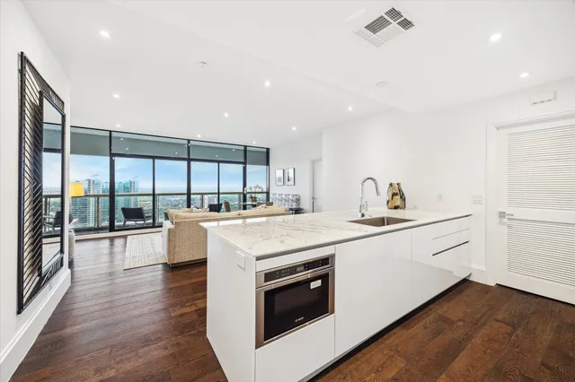 a kitchen with a stove and a sink