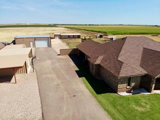 an aerial view of a house with garden space
