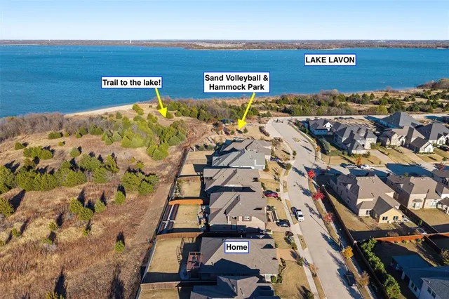 a view of a yard and mountain view in back