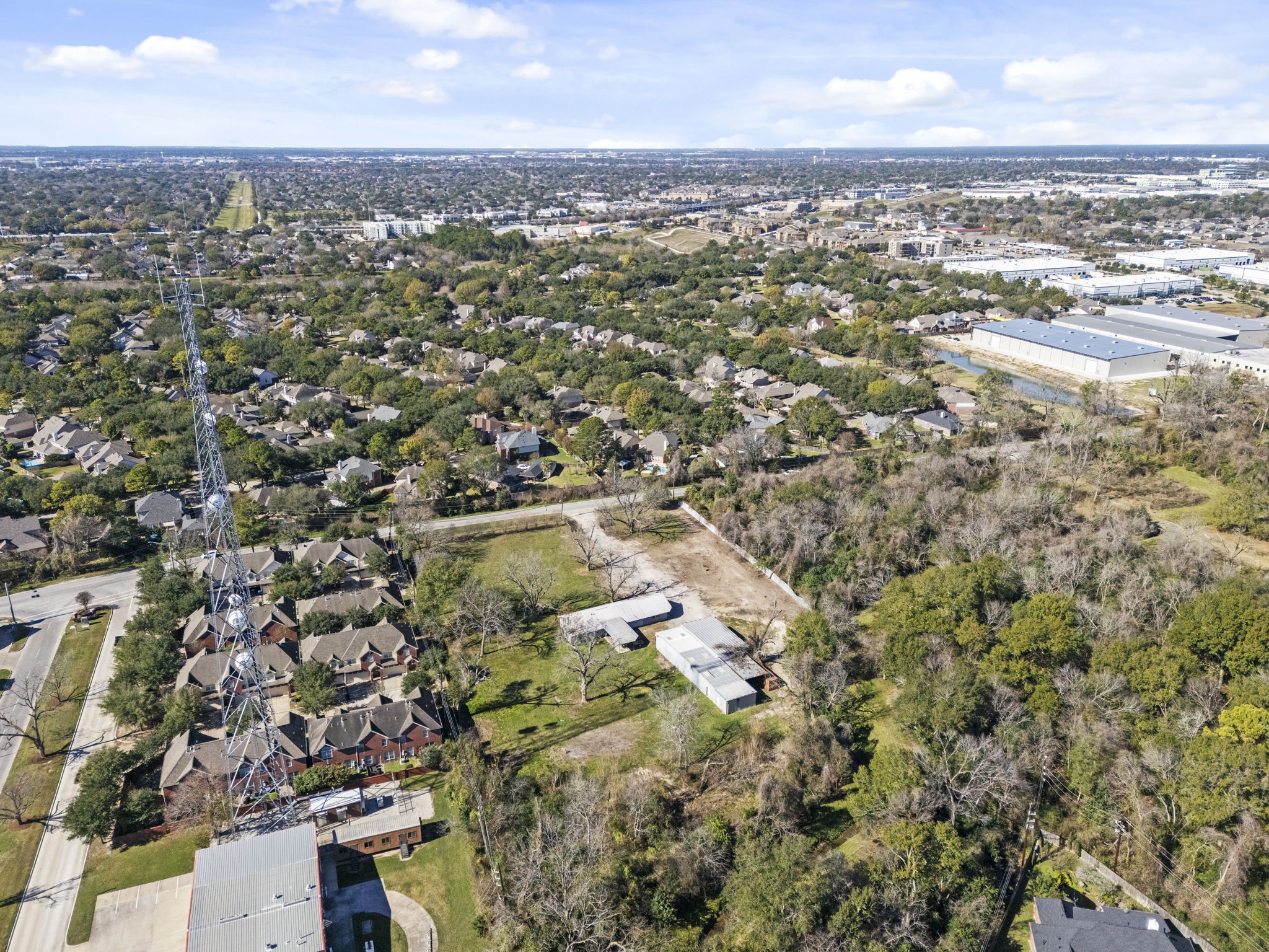 8438 Windfern Road Houston, TX 77040 - Photo 16 of 22 an aerial view of residential building with parking space