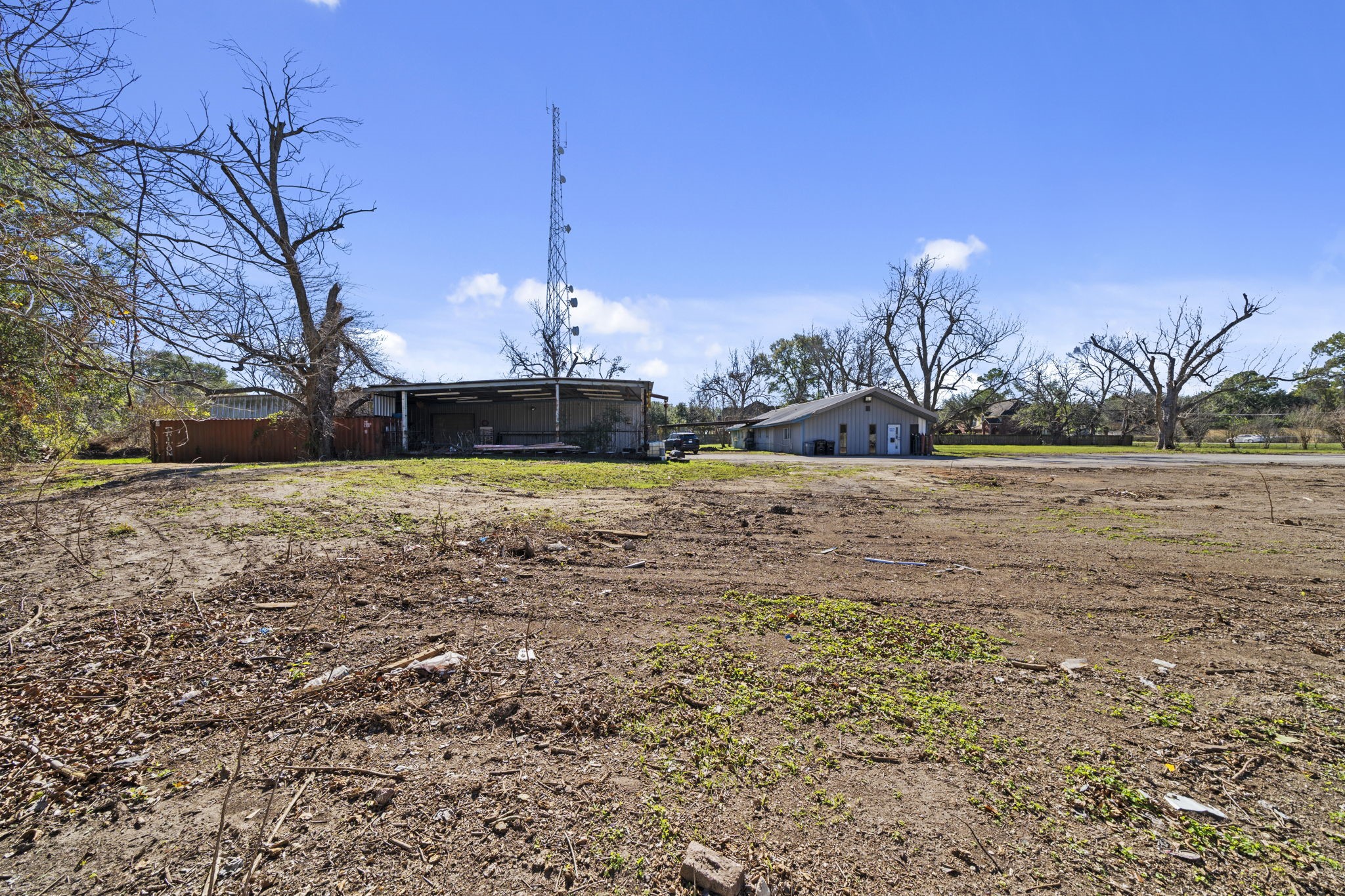 8438 Windfern Road Houston, TX 77040 - Photo 8 of 22 a view of a house with a yard