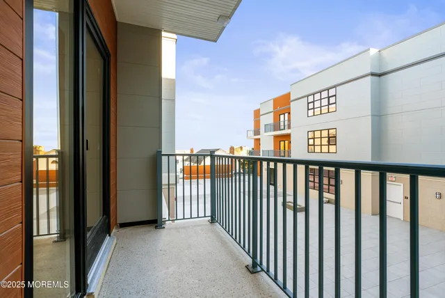 a view of a street from a balcony