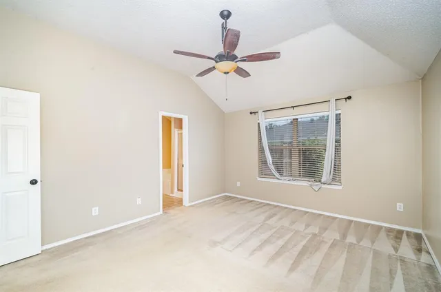 a view of an empty room and window
