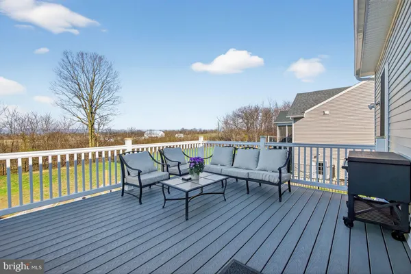 a view of a terrace with seating space