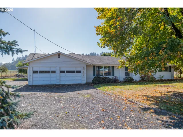a house view with a garden space
