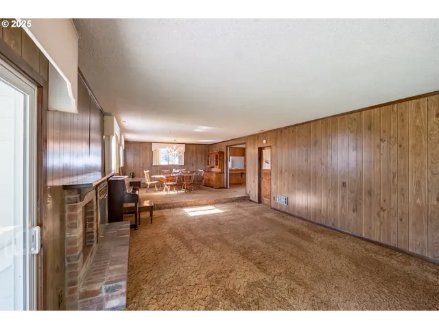 a bathroom with a double vanity sink a mirror and a shower