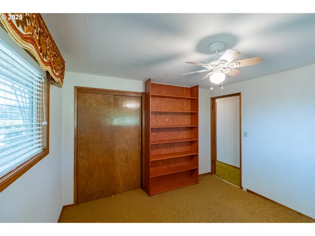 a view of an empty room with window