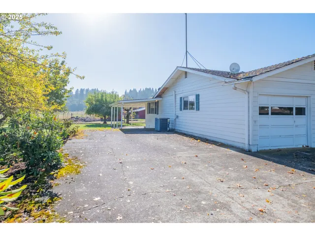 a house view with a backyard space