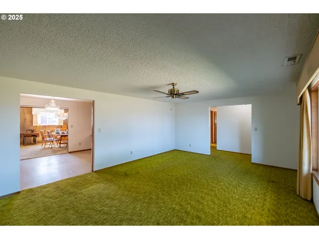 a bathroom with a sink a mirror and a shower