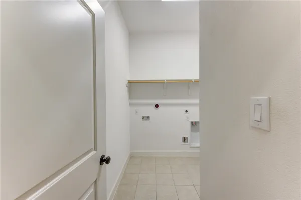a bathroom with a granite countertop sink toilet a mirror and shower