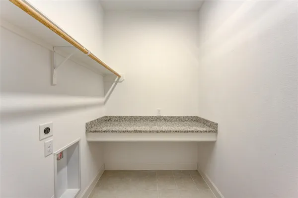 a bathroom with a shower and a toilet