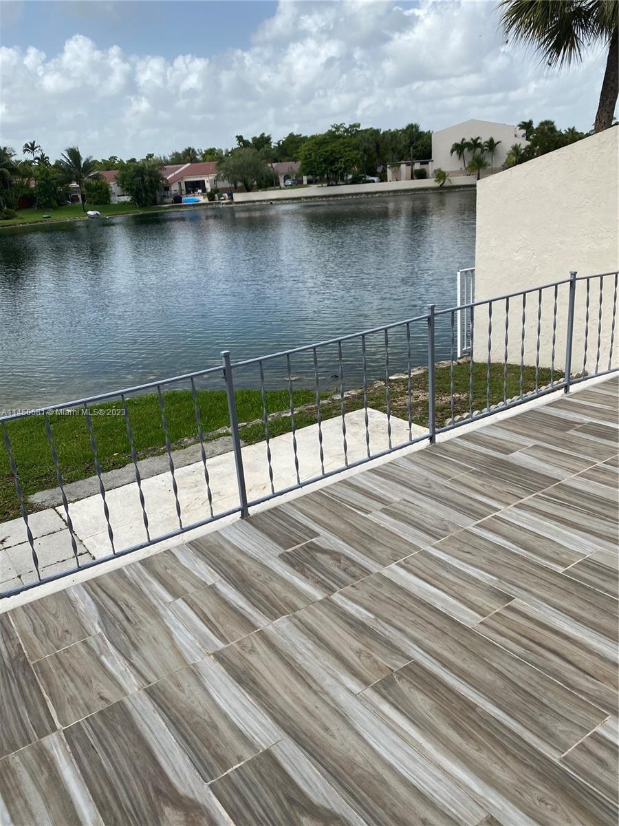 7262 Jacaranda Lane, Unit 7262 Miami Lakes, FL 33014 - Photo 2 of 9 a view of lake