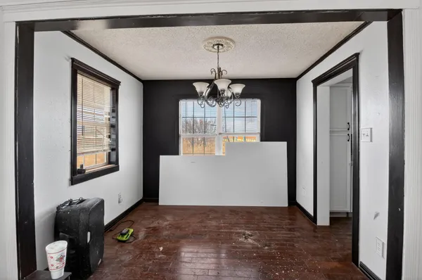 a view of a livingroom with windows