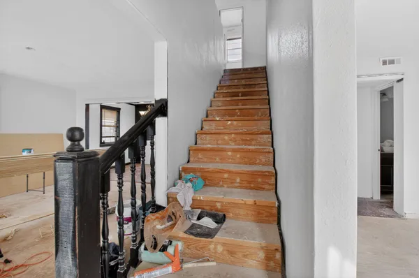 a view of entryway with wooden floor