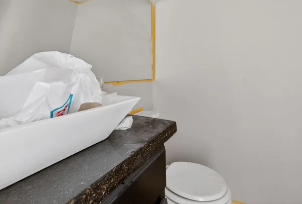 a bathroom with a toilet