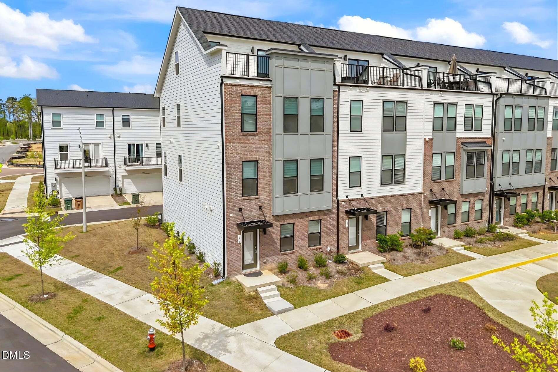 501 Hedrick Ridge Road Cary, NC 27519 - Photo 43 of 47 a view of a building with a swimming pool