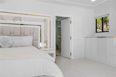 a view of a patio with a table and chairs