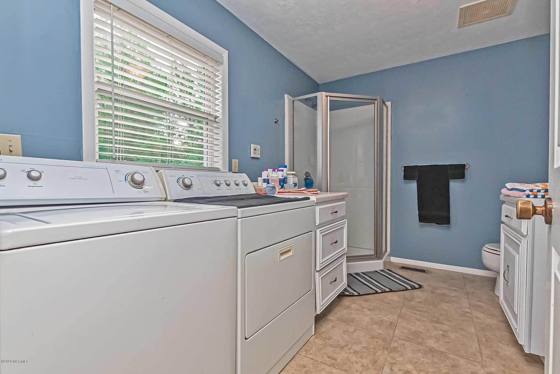 289 Lester Watts Road Tabor City, NC 28463 - Photo 12 of 29 2nd bathroom with laundry area